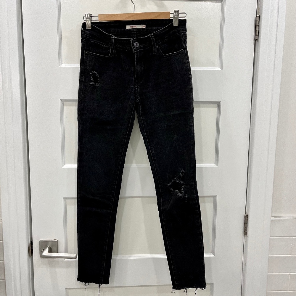 Levi's 711 size 26, ripped with raw hem